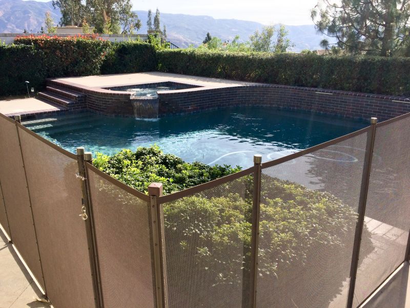 Mesh Fence Secured at Pool